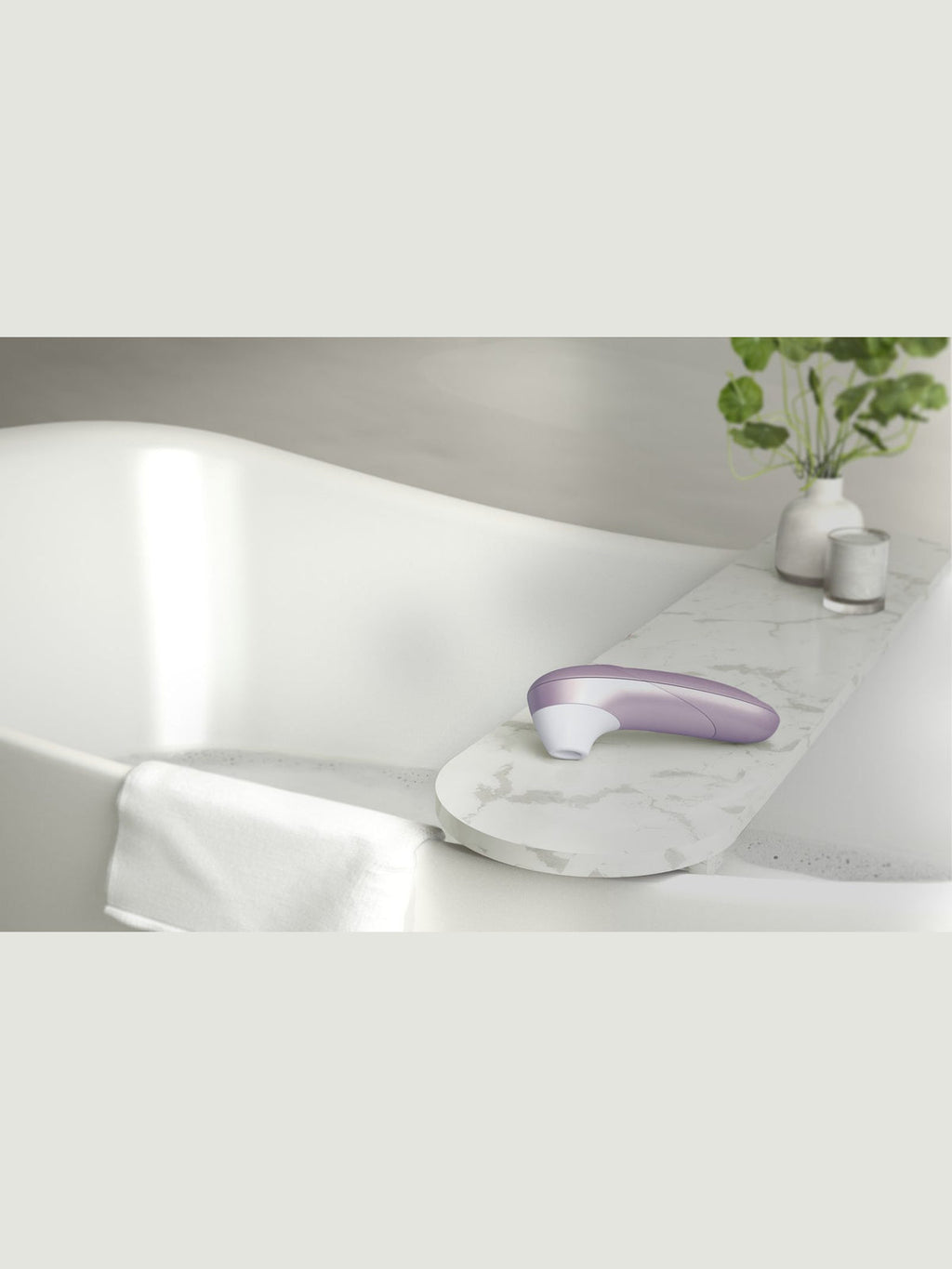 Estimulador de clitóris por ondas de ar, 11 níveis, à prova de água – Lilás · Womanizer Pro (foto 10)