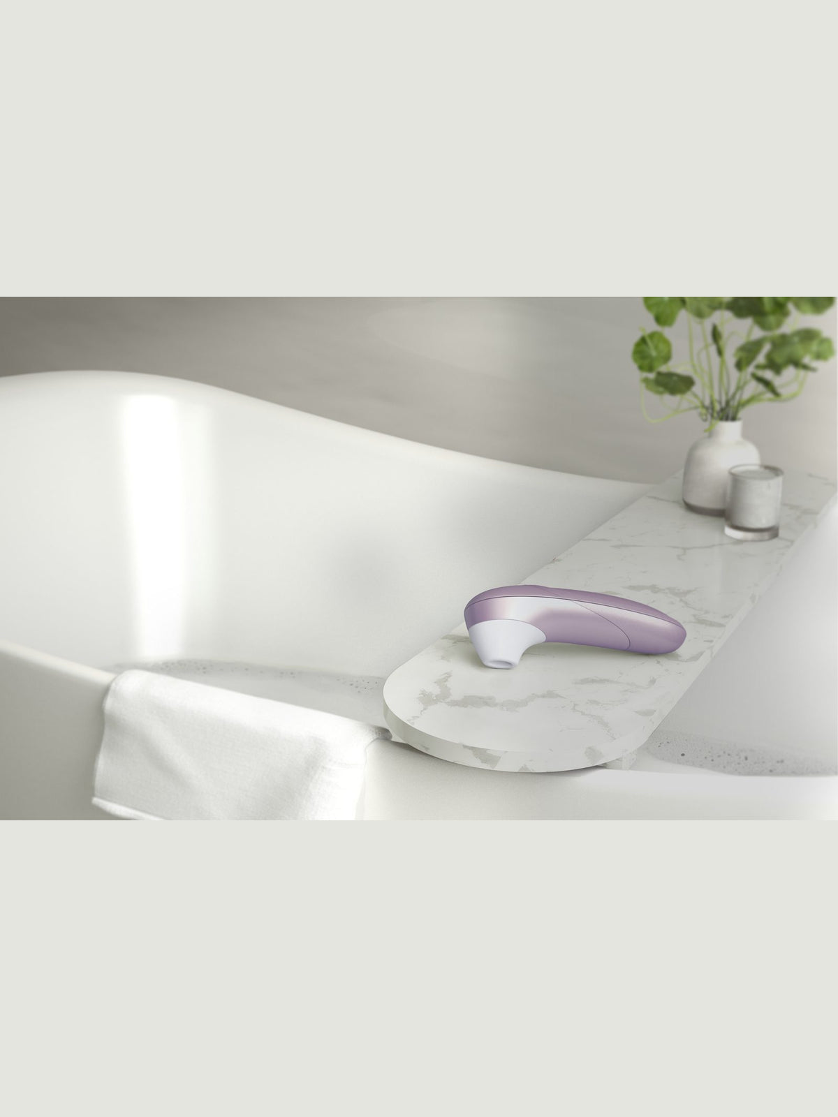 Estimulador de clitóris por ondas de ar, 11 níveis, à prova de água – Lilás · Womanizer Pro (foto 10)